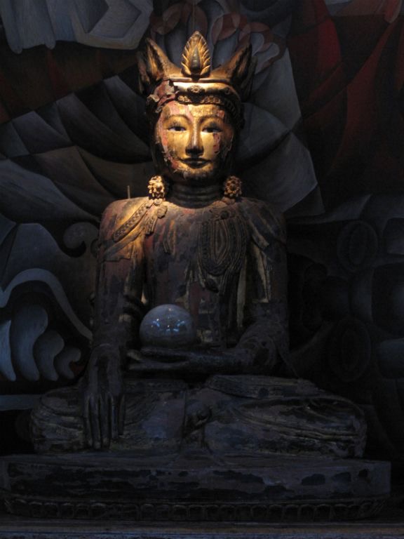 Burmese Buddha figure reflecting Asian trade-route influence